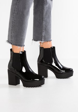 Enkellaarsjes met hoge hak - black