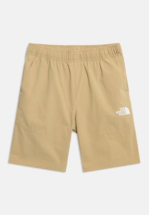 Bézs elastīgas jostasvietas šorti ar sānu kabatām un baltu The North Face logotipu uz kreisās kājas, izvietoti plakaniski uz balta fona.