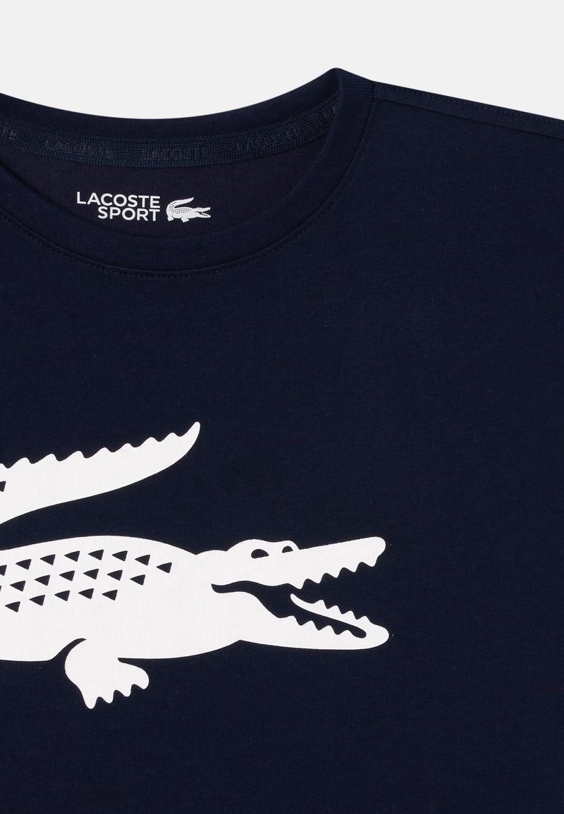 Zalando Lacoste Shirt Big Logo Lacoste Sport UNISEX Print T-shirt