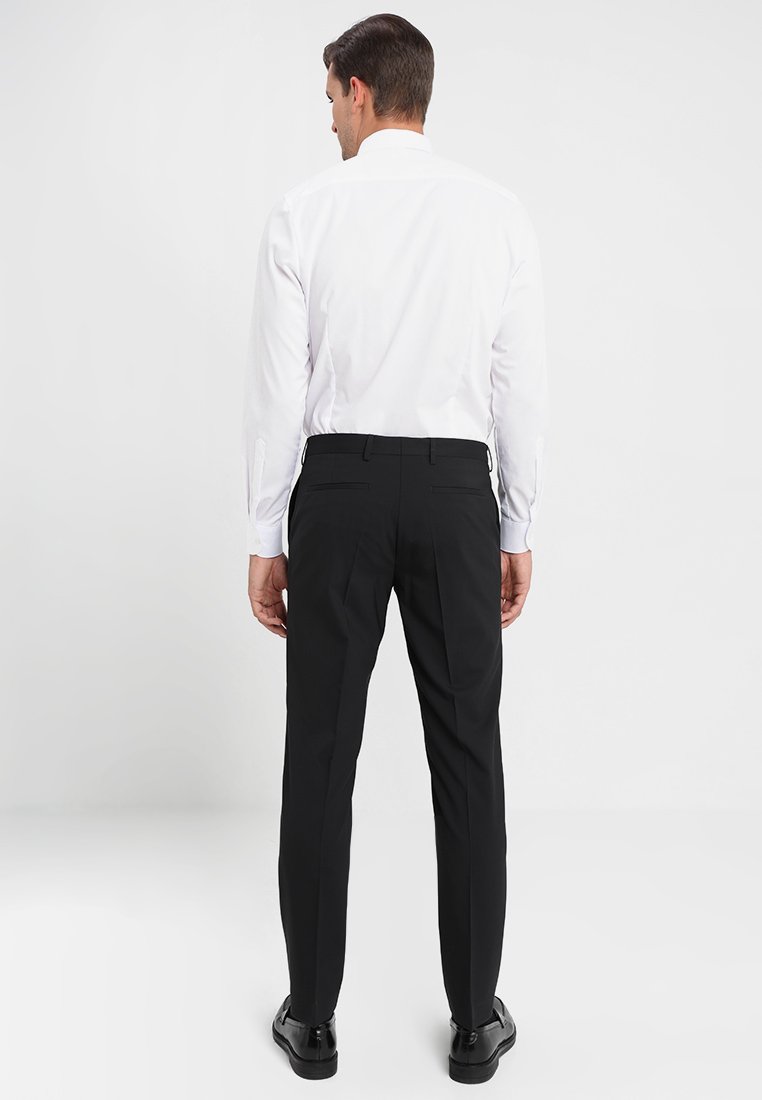 Tommy Hilfiger Tailored Pantaloni eleganti - black/nero - Zalando.it