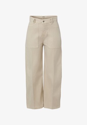 Pantalon beige à jambes larges, taille haute, poches plaquées devant, passants pour ceinture et fermeture par bouton.