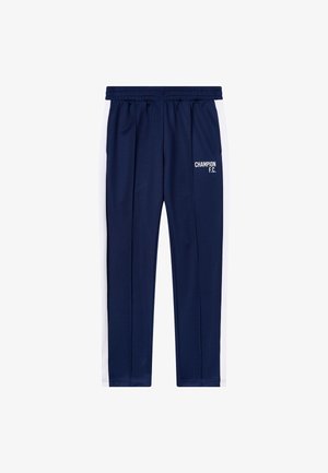 Granatowe spodnie sportowe z białymi paskami po bokach. Posiadają elastyczny pas i nadruk "CHAMPION F.C." w białym kolorze z przodu. Wykonane z gładkiego materiału.