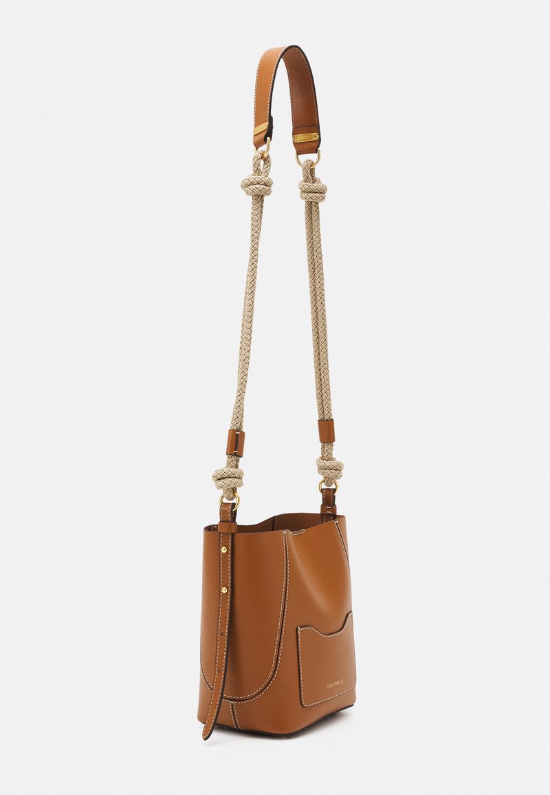 Coccinelle Evasion Across Body Bag Caramel Camel Zalando Co Uk
