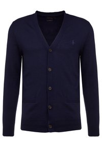 Námořnický cardigan vyrobený z pletené látky s výstřihem do V, obsahující šest knoflíků, dvě přední kapsy a malé vyšívané logo na hrudi.