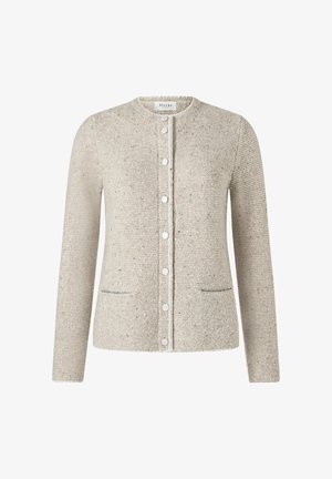 Vaaleanbeige neuletakki, joka on valmistettu teksturoidusta neulekankaasta. Siinä on pyöreä kaulus, nappisuljenta ja kaksi etutaskua sinisillä yksityiskohdilla.