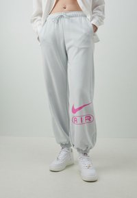 Nike Sportswear AIR JOGGER - Tracksuit bottoms - photon dust
