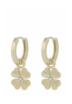 Gold hoop earrings with dangling four-petal flower charms, each flower featuring a small clear stone at its center.