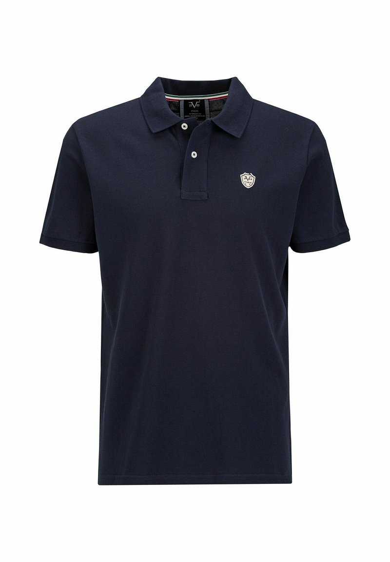 Navyblauwe polo shirt gemaakt van katoen met een kraag, twee knopen en een klein embleem op de borst. Korte mouwen en een klassieke pasvorm.