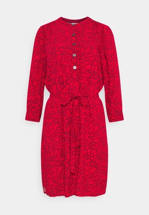 Red knee-length dress with long sleeves, black floral pattern, front buttons, round neckline, and waist tie belt.