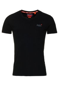 Camiseta de algodón negra con cuello redondo, mangas cortas y un pequeño logotipo bordado en el pecho. Tejido suave con un corte ajustado.