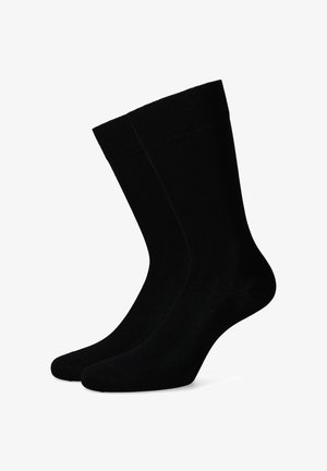 Czarne skarpetki z mieszanki bawełny z prążkowanym wykończeniem, gładką teksturą oraz wzmocnionym palcem i piętą, zaprojektowane z myślą o komforcie i trwałości.