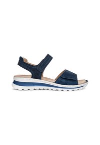 Navy blue open-toe sandal with adjustable straps, cushioned beige footbed, and white sole with blue accent and textured tread.