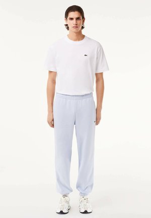 CLASSIC - Pantalones deportivos - bleu clair jg