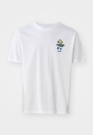 White cotton t-shirt featuring a graphic print with 'CONVERSE MOTEL' text, a star, and palm trees in blue and yellow hues. Short sleeves.