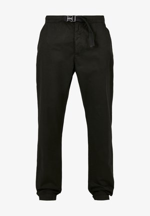 Czarne, lekkie spodnie z elastycznym pasem i sznurkiem do regulacji. Zwężane nogawki z mankietami przy kostkach i gładka tekstura.