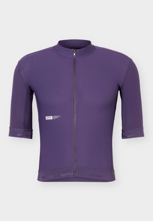 Lilla sykkeltrøye med korte ermer, glidelås foran og liten hvit SRK Sportsful Riders Kit-logo på venstre bryst.