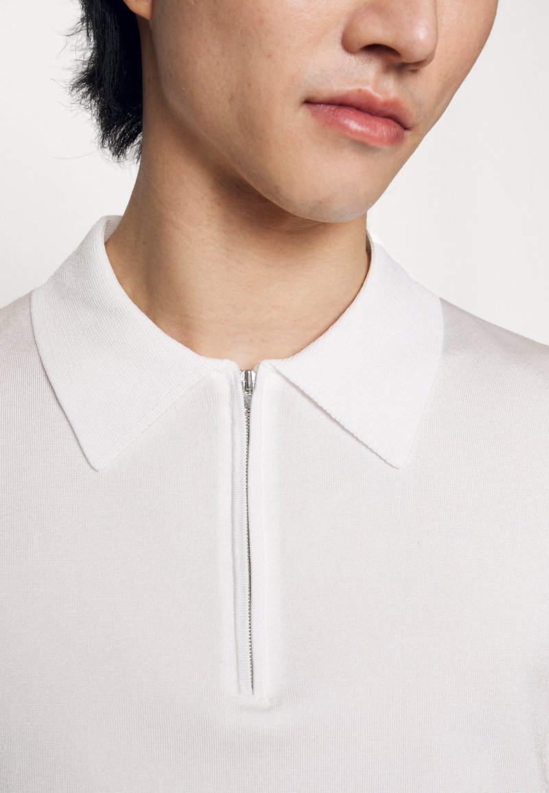 Herren T-shirts & Polos | sandro PABLO ZIP Poloshirt ecru/offwhite - KE30422 Herren T-shirts & Polos | sandro PABLO ZIP Poloshirt ecru/offwhite - KE30422