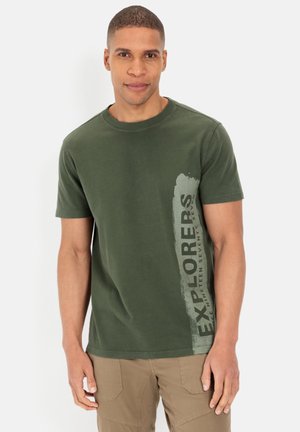 Green cotton t-shirt featuring short sleeves, a crew neckline, and a textured design with the word "EXPLORERS" printed in gray.