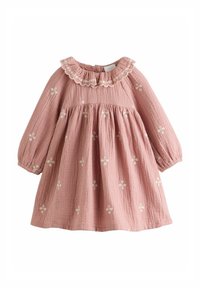 Pink cotton dress with long sleeves, ruffled collar, and floral embroidery. Textured fabric with gathered bodice and flared skirt.