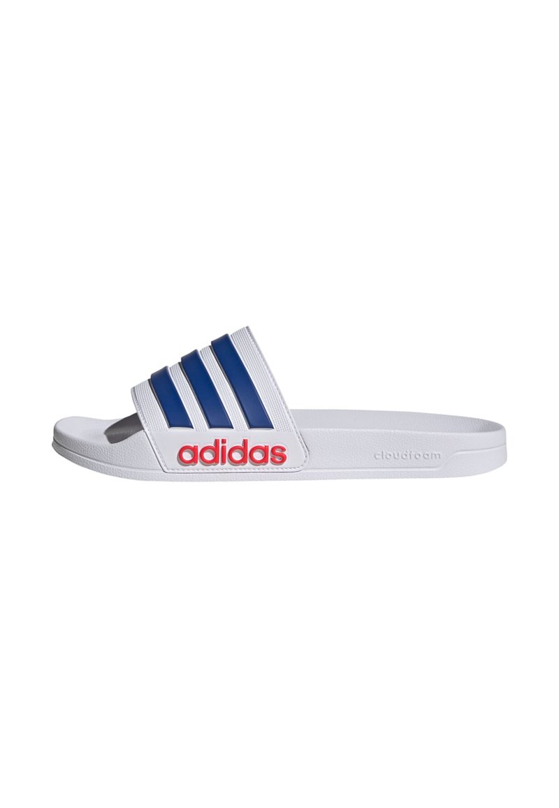 White slide sandal with three blue stripes across the top, red "adidas" logo, textured upper, and cushioned outsole labeled "cloudfoam."
