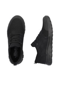 Black shoes with a mesh upper and synthetic leather accents. Cushioned sole, round toe, and lace-up design. Textured tread on the outsole.