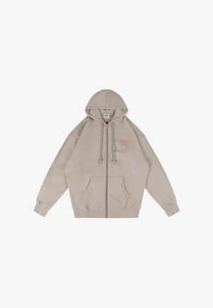 Beżowa bluza rozpinana na zamek z przednimi kieszeniami, kapturem ze sznurkiem, ściągaczami na mankietach oraz małym haftowanym logo na lewej piersi.