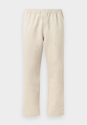 Pantalones beige de pierna recta con cintura elástica, frente liso y sin bolsillos visibles sobre un fondo claro.