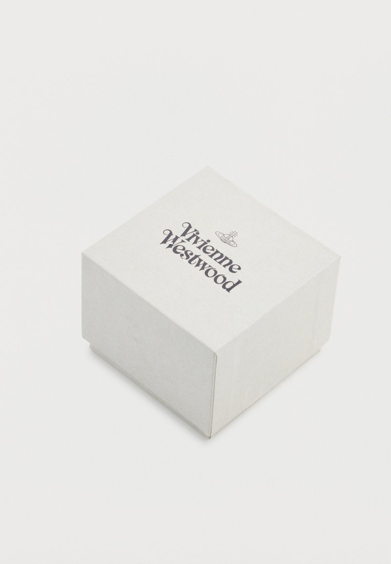Square cardboard box in light gray with a smooth texture. Front features the printed name "Vivienne Westwood" in bold black font.