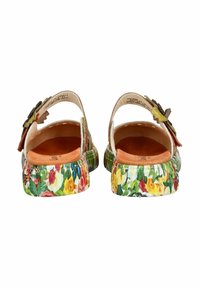 Sandales florales avec une tige imprimée présentant des roses et d'autres fleurs. Design ouvert à l'arrière, semelle intérieure rembourrée et semelle en caoutchouc texturée.
