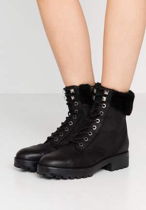 Bottines à plateau - black