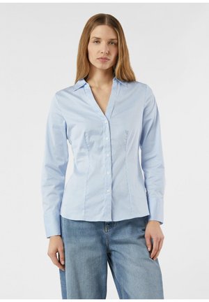 Light blue striped button-up shirt with a collar, long sleeves, and fitted silhouette. Fabric appears smooth with a slight sheen.