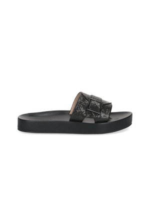 Black slide sandal with thick sole and single textured strap featuring a large adjustable buckle, angled sideways on white background.