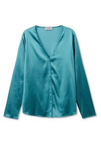 Turkos satinblus med långa ärmar och V-ringning; har en slät textur och enkel design, med en något rundad nederkant.