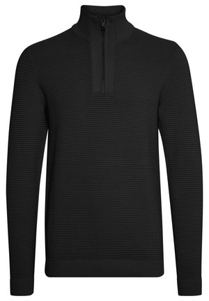 Pull-over noir avec col haut et fermeture éclair moitié. Il présente un design texturé à côtes et des manches longues.