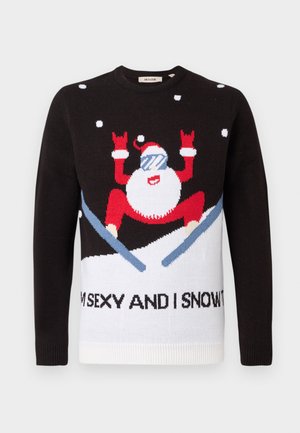 Sweater de malha preta com seção inferior branca apresentando uma figura do Pai Natal em vermelho com óculos de sol e neve. O texto diz: "EU SOU SEXY E EU SEI DISSO."