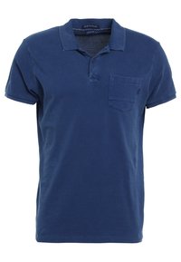 Navyblaues Poloshirt aus Baumwollstoff mit klassischem Kragen, Zwei-Knopf-Leiste und einer Brusttasche. Kurzarm.