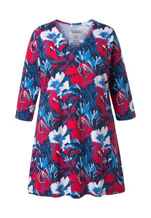 Kukkakuvioinen tunikamekko, jossa on V-aukko, 3/4-hihat ja kirkas kuvio punaisista, valkoisista ja sinisistä kukista tummansinisen taustan päällä.