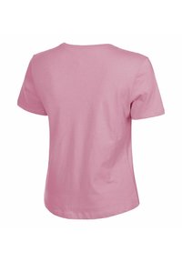 T-shirt a girocollo, con maniche corte, in morbido cotone rosa. Tessuto liscio, vestibilità casual e un design semplice senza grafiche o dettagli visibili.