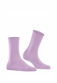 Hell lilafarbene Baumwollsocken mit glatter Textur, mittlerer Crew-Höhe und nahtloser Zehenpartie. Sie zeichnen sich durch ein einfaches Design ohne Muster oder Akzente aus.