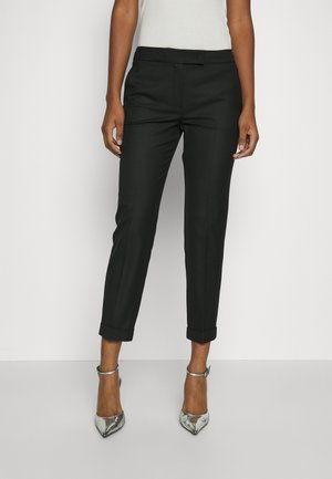 MONOPOLI - Trousers - black