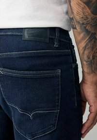 Next MOTION FLEX - Slimfit džínsy - blue dark