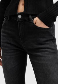 AllSaints HALDAN - Bootcut-farkut - black