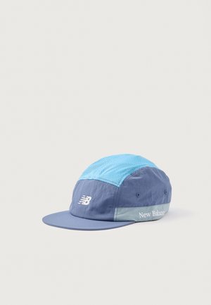 Blue and light blue cap with a mesh top, flat brim, and New Balance logo printed on the side. Soft fabric with a smooth texture.