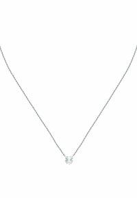 Collier en argent délicat avec un petit pendentif en forme de trèfle à quatre feuilles centré sur une fine chaîne.