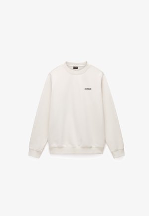 Ljusbeige pullover-tröja i mjukt tyg. Har rund hals, ribbade muddar och en liten logotyp på bröstet.