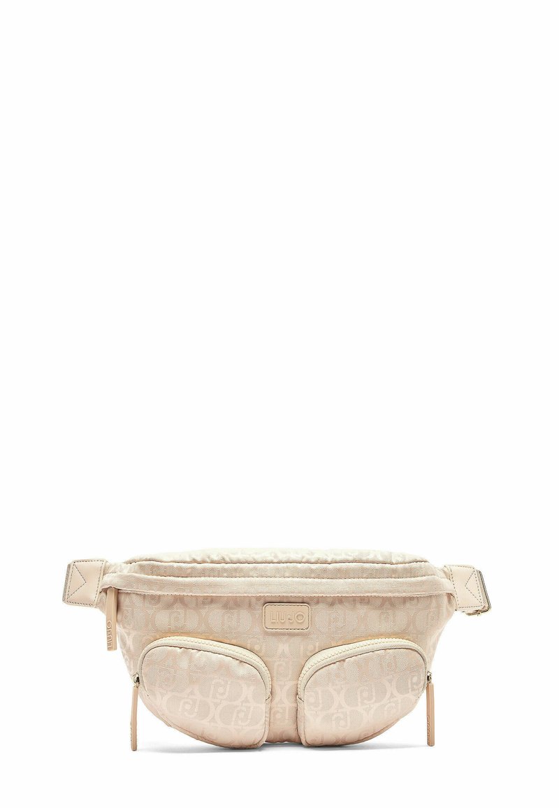 Sac banane en tissu beige avec motif logo en relief, compartiments zippés et bandoulière réglable. Surface douce et texturée avec une forme arrondie.