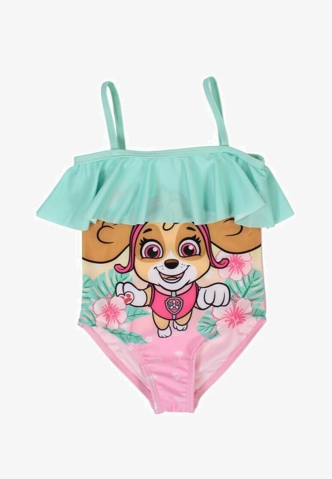 Un maillot de bain pour enfants avec un haut froncé vert menthe, un bas rose et un personnage de chien de dessin animé entouré de fleurs tropicales.