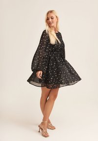 GINI LONDON STAR PRINT LONG SLEEVE MINI - Day dress - black