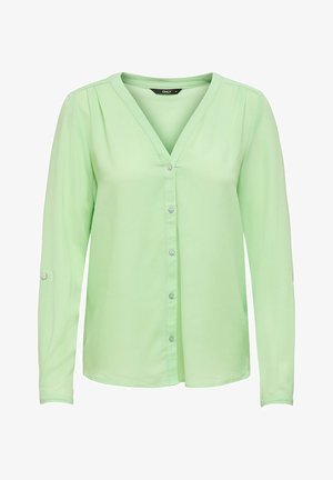 Lysgrøn langærmet bluse med V-hals, knaplukning, tekstureret stof og subtile plisseringer på skuldrene.