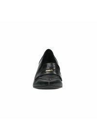 Black leather shoe with a low heel, rounded toe, and two decorative straps across the front. Smooth texture, minimalistic design.
